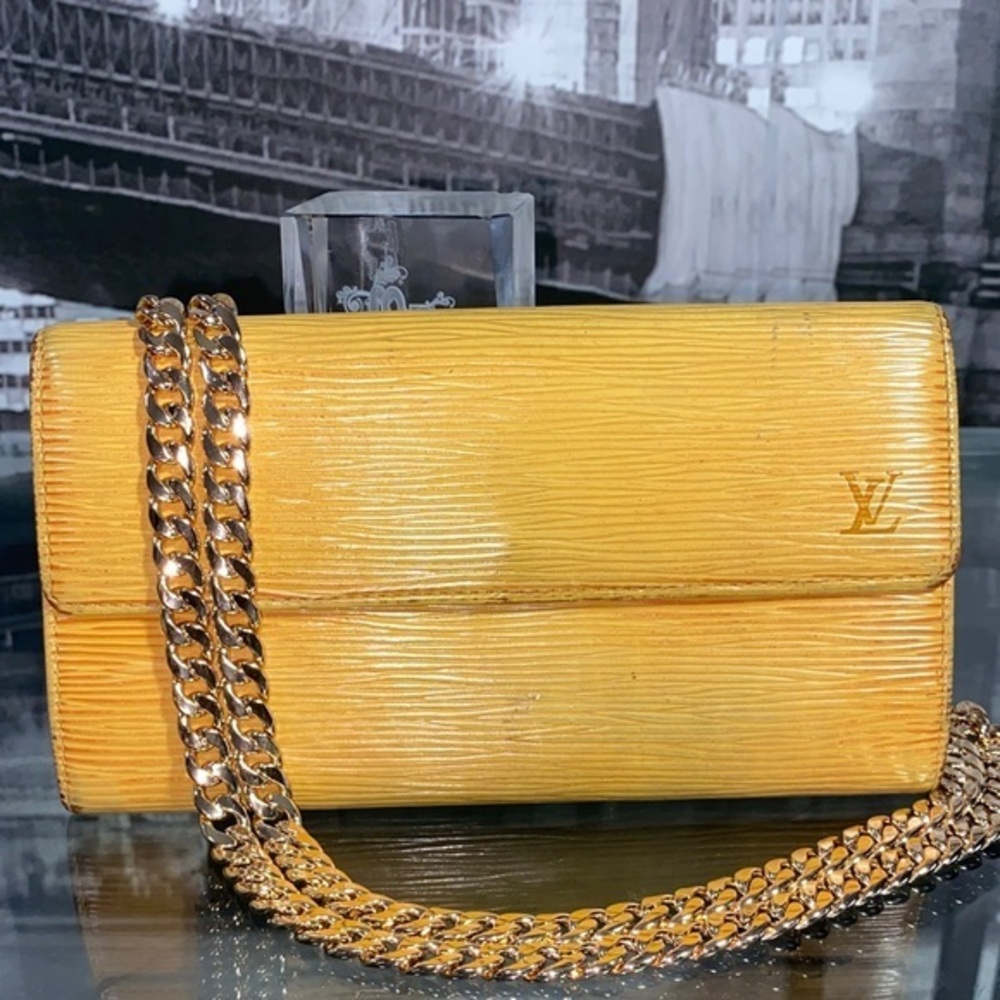 Authentic Louis Vuitton Yellow Epi Leather Sarah Wallet Flap Closure